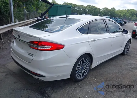 2017 Ford Fusion Hybrid Platinum from USA, damaged, VIN 3FA6P0RU5HR261962
